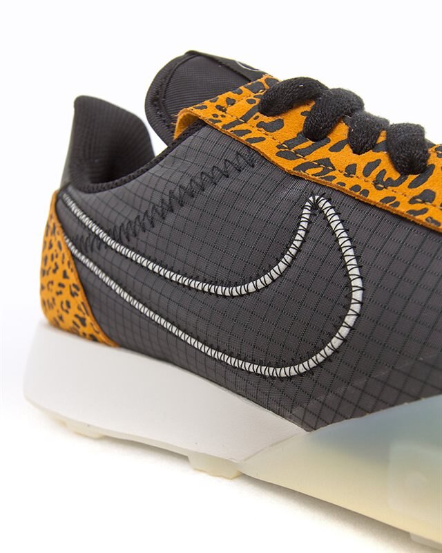nike waffle racer animal print
