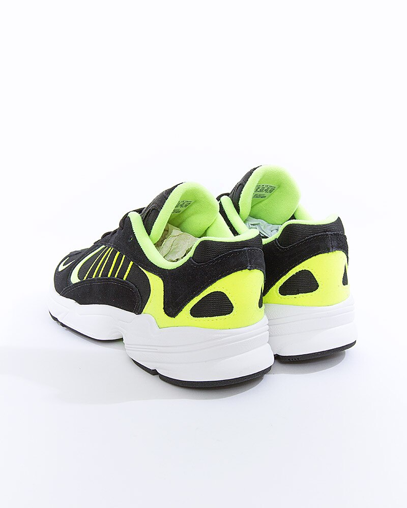 nmd black solar orange